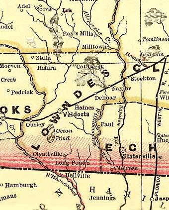 Lowndes County, 1883, GeorgiaInfo, George Cram Map of Georgia, 1883, finally drops Troupville, and has Hahira, a town named “Cat Creek”, Milltown (Lakeland), Naylor, Stockton, and Statenville, with Grand Bay flowing into the Alapahoochee River marked “Withlocoochee River”, yet the Withlacoochee is marked “Withcacochee River”.