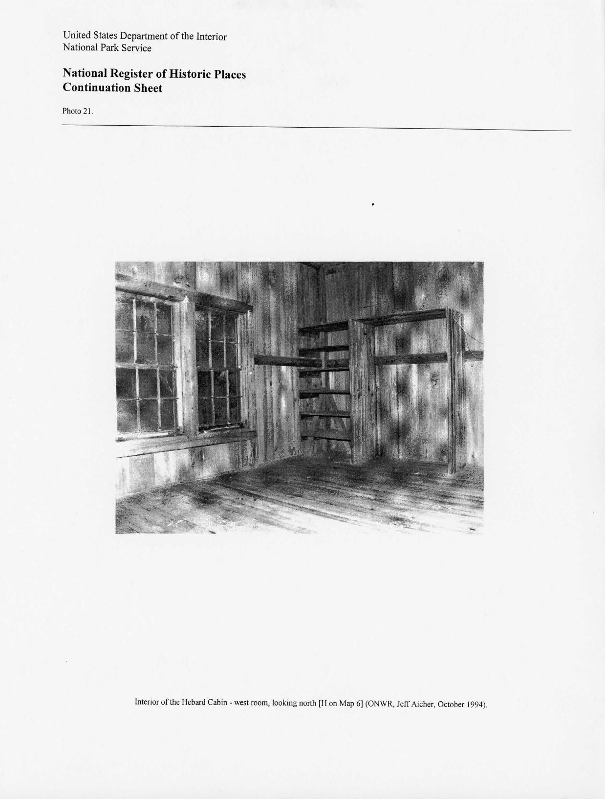 Photo 21: Interior of the Hebard Cabin - west room, looking north [H on Map 6] (ONWR, Jeff Aicher, October 1994),