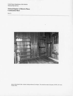 [Photo 22: Interior of the Hebard Cabin - kitchen, looking northwest {I on Map 6]. The closed door leads to the pantry (ONWR, Jeff Aicher, October 1994).]