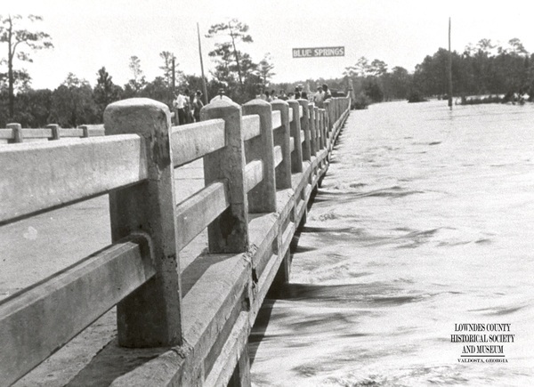 During flood of-1928 with Blue Springs sign