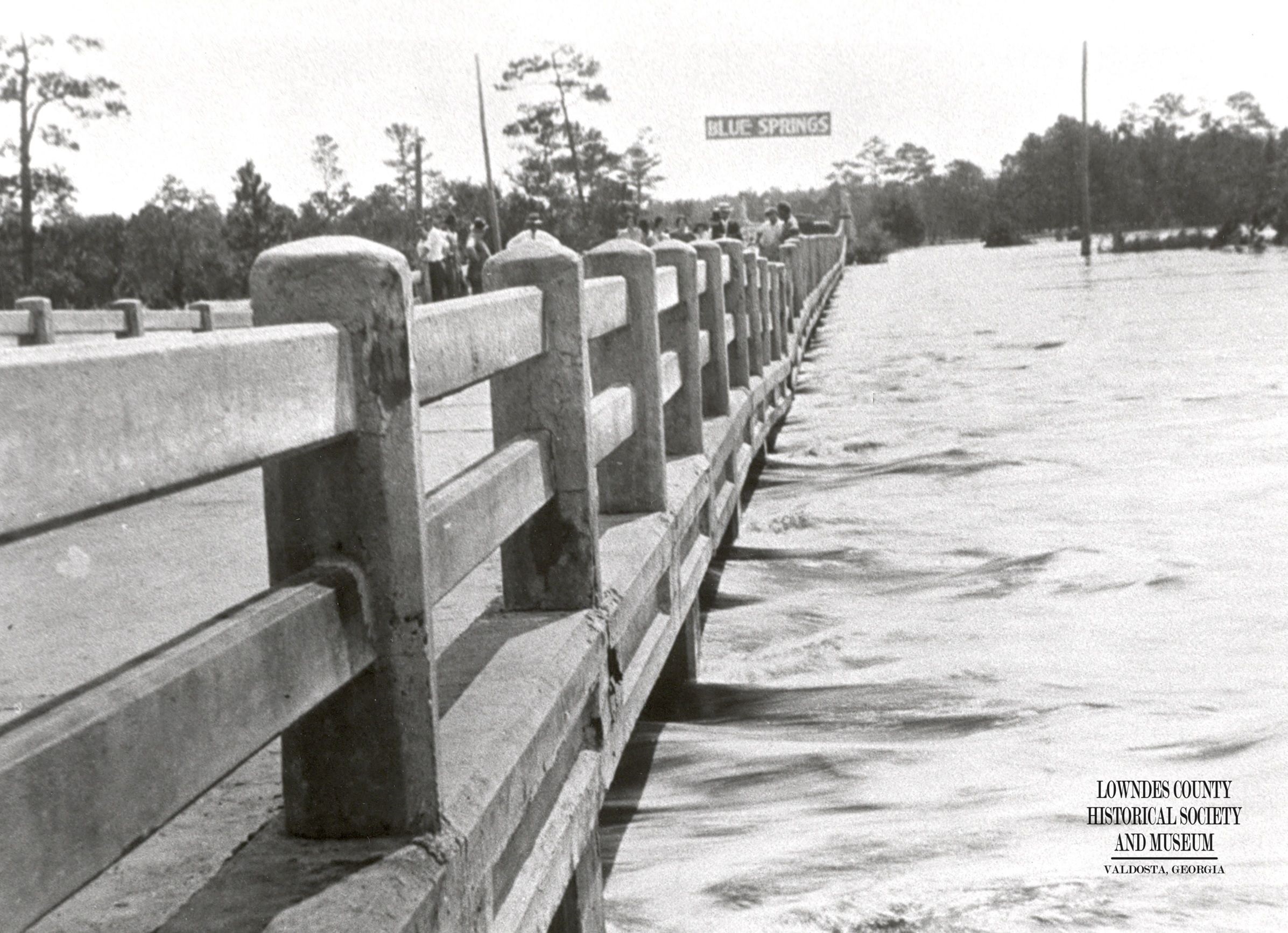 During flood of-1928 with Blue Springs sign