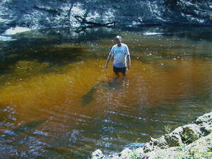 [Mike Randall with one large sturgeon right next to him and another in the lower left corner, 2025-09-12 --Ken Sulak]
