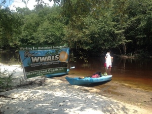 [WWALS banner at lunch beach, --GQ C2 12:17:01, 31.0082861, -83.0230861]