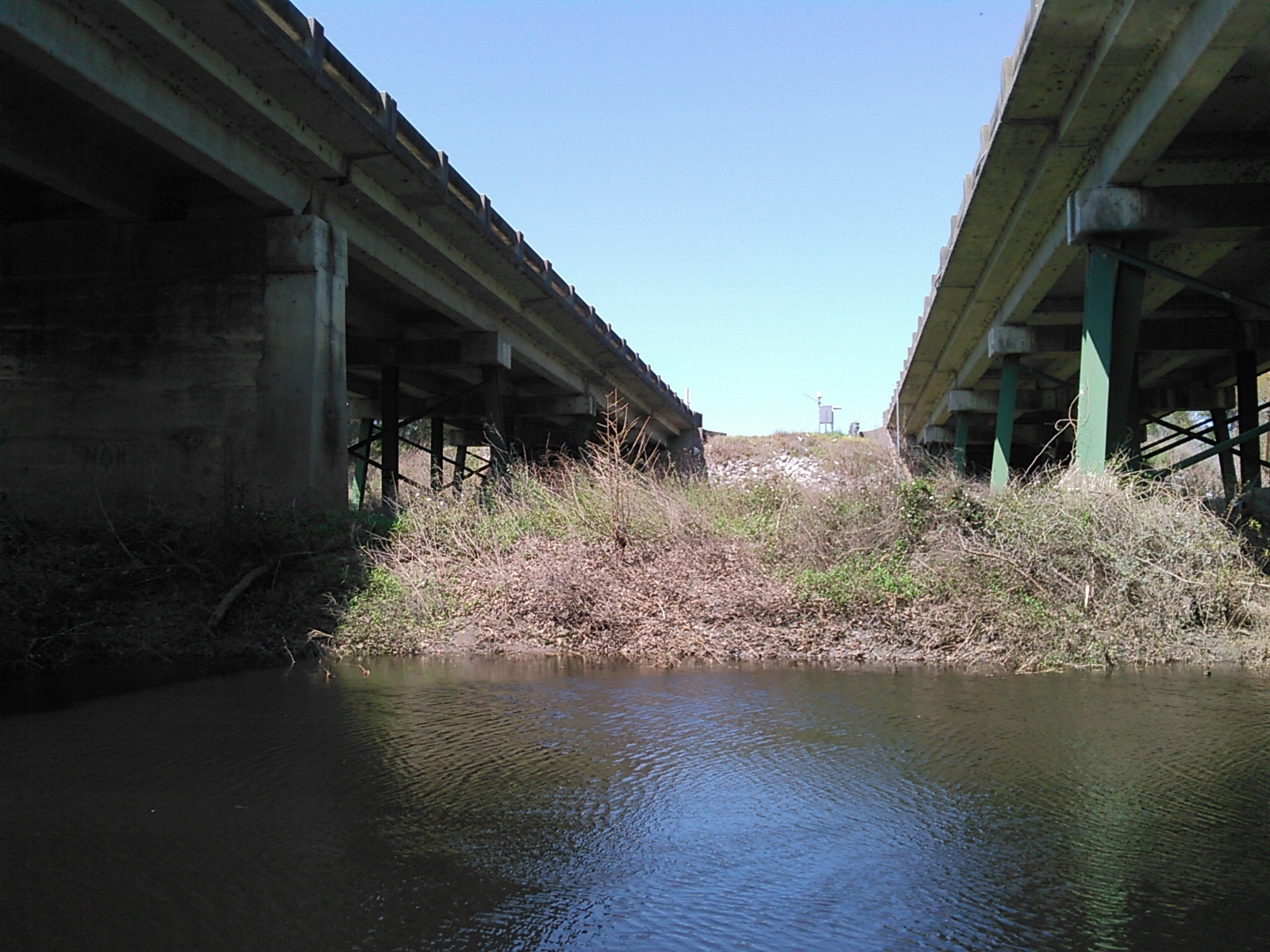 USGS gauge, between US 41 bridges on west bank 30.8926620, -83.3188476