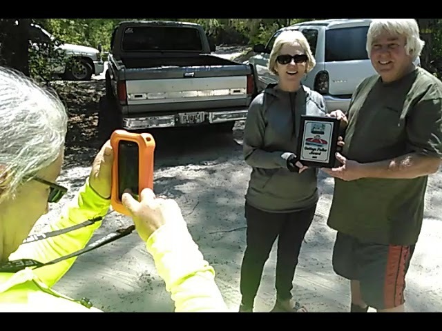 Shirley Kokidko accepts Faller award from Phil Hubbard at Mayday