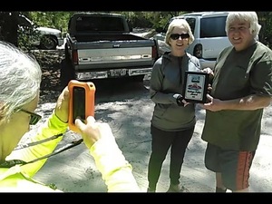 [Shirley Kokidko accepts Faller award from Phil Hubbard at Mayday]