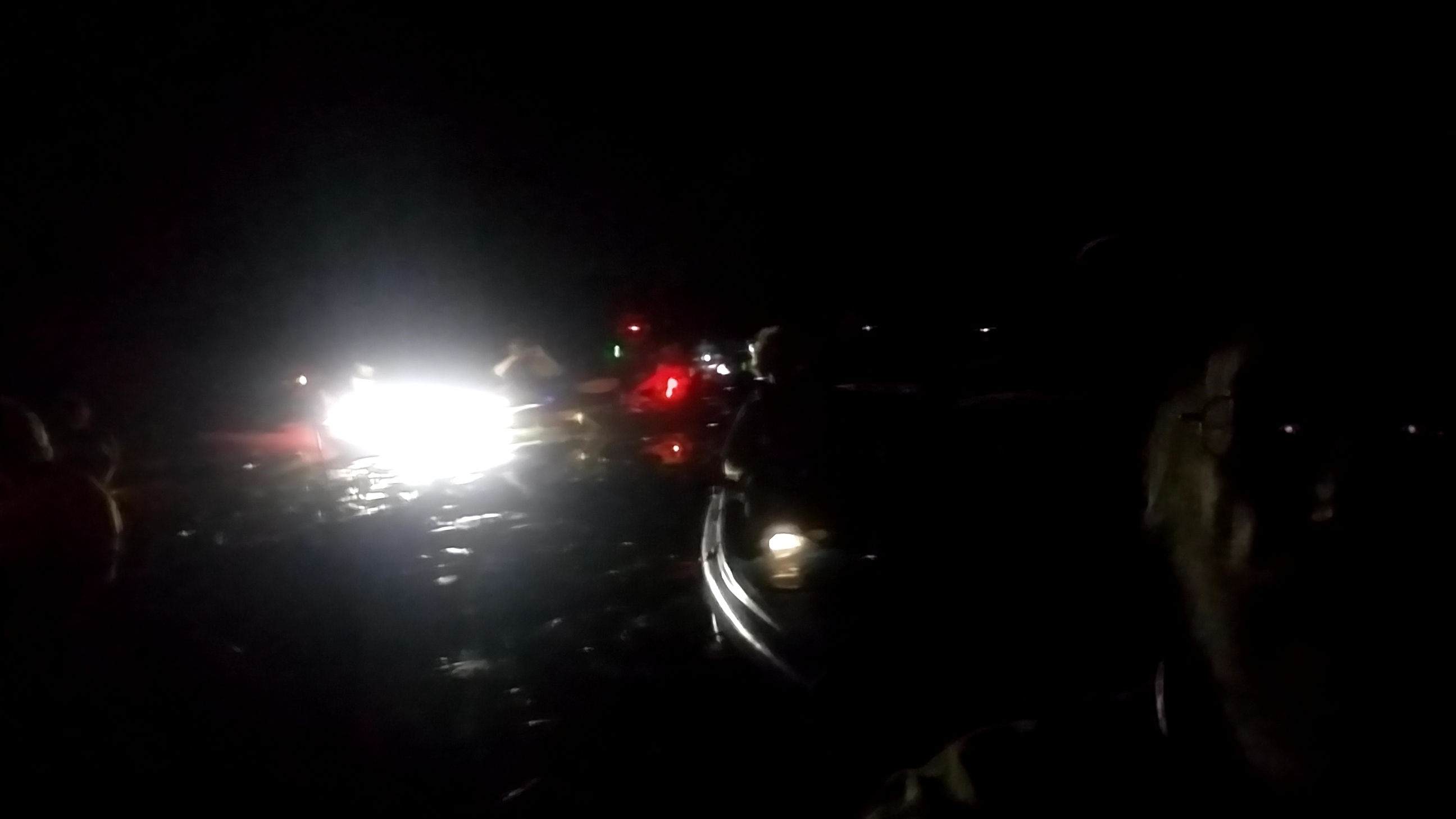 Blurry lighted paddlers on Banks Lake