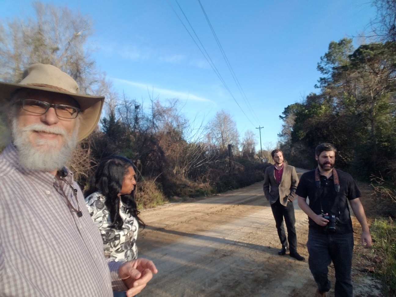 Suwannee Riverkeeper John S. Quarterman, nearby resident Debra Tann, VDT reporter Thomas Lynn and photographer Derrek Vaughn, at Beatty Branch, January 7, 2019. Photo: John S. Quarterman for WWALS.