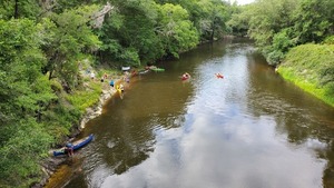 [Joe Cook at near canoe]