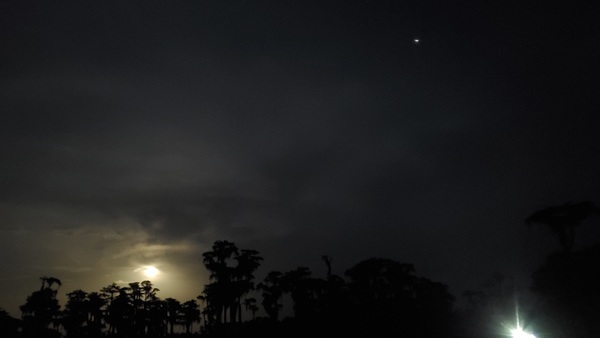 [Moon, Jupiter, boat light]