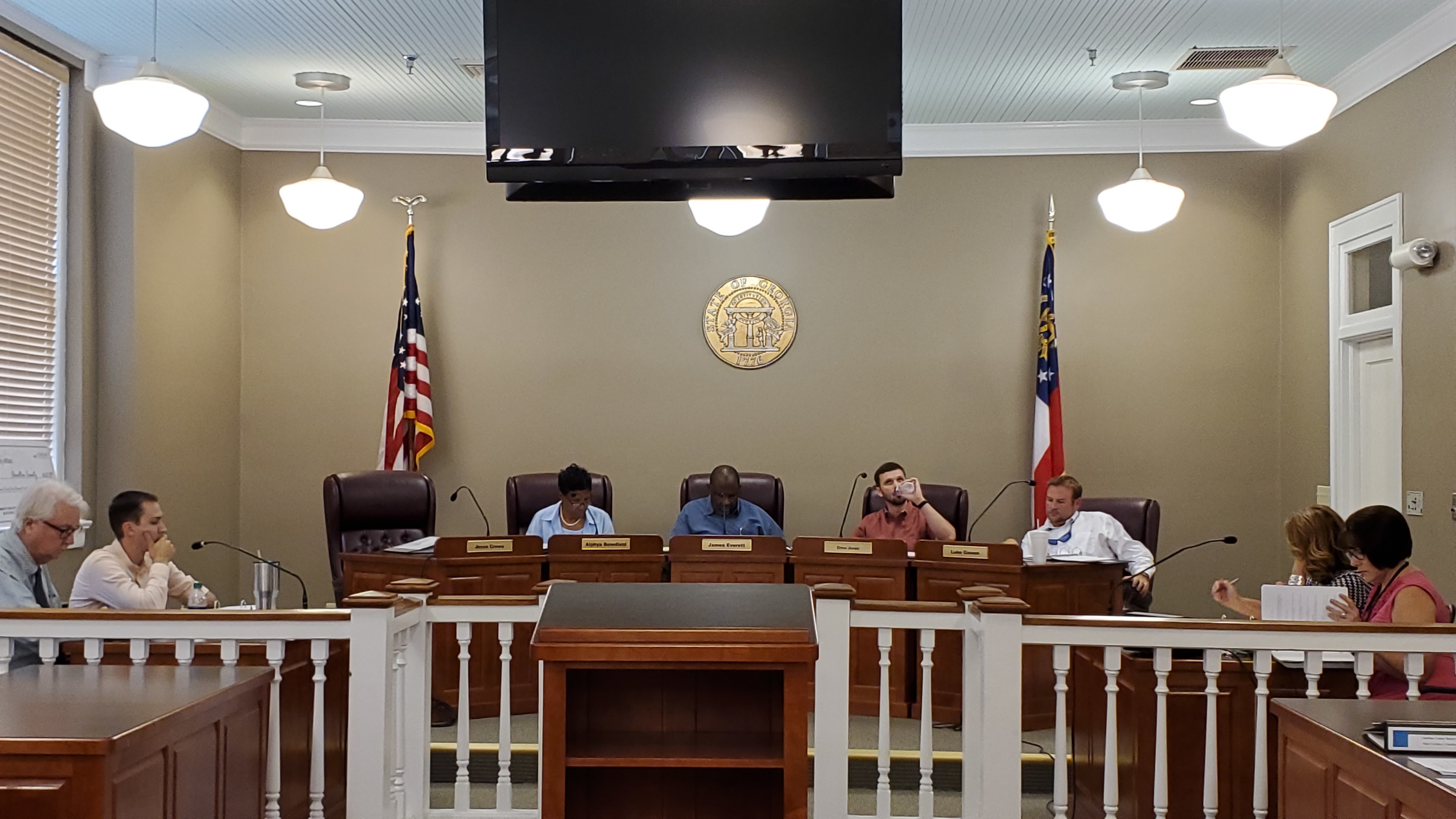 Attorney?, County Administrator Hampton Raulerson, Absent Jesse Crews (3), Vice Chair Alphya Benefield (1), Chair James E. Everett (2), , Drew Jones (4), Luke Gowen (5), County Clerk Jenifer Nobles, Finance Coordinator Rebecca Harden