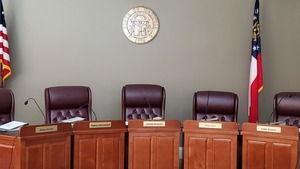 [Commissioner seats: Jesse Crews, Alphya Benefield, James Everett, Drew Jones, Luke Gowen]