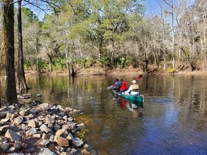 [Reporters in Suwannee Riverkeeper canoe]