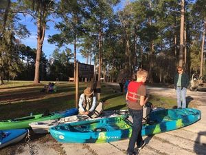 [Bret Miller, NWXpeditions, outfitting a paddler]