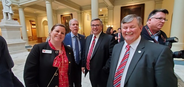 [Merritt Wall of VSU, Valdosta Mayor Scott James, John D. Crawford of VSU, Lowndes County Chairman Bill Slaughter]