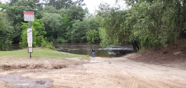 [Jsq: Suzy Hall with a bucket at Nankin Boat Ramp]