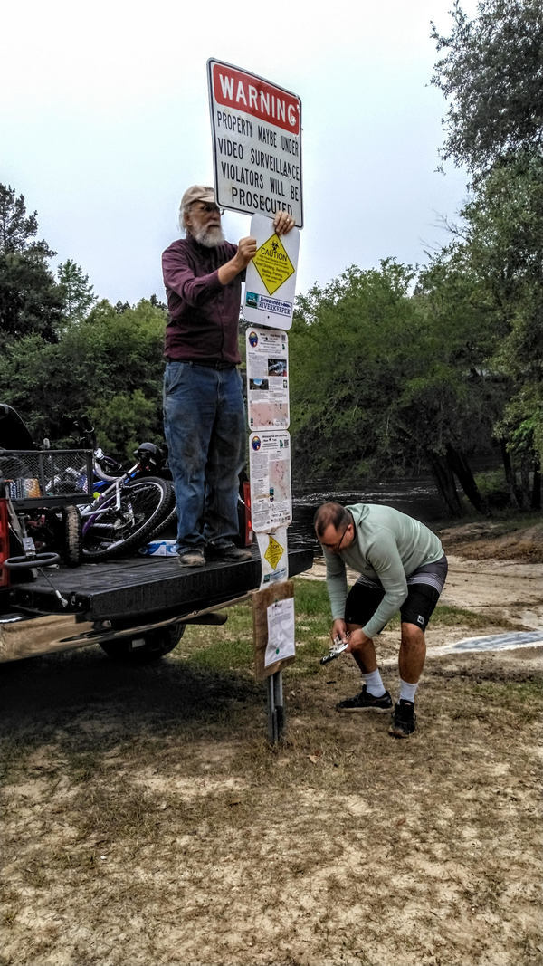 [Suzy Hall Nankin jsq, Bobby attaching sign]