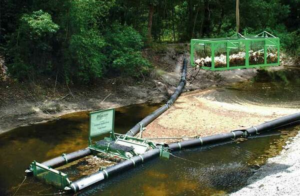 [Bandalong trash trap, canal before Satilla River]