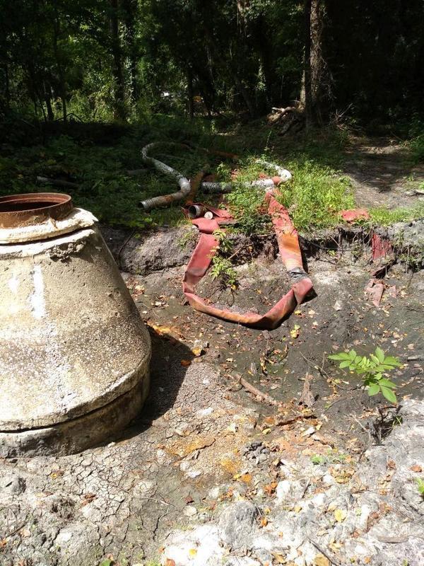 Manhole with hose