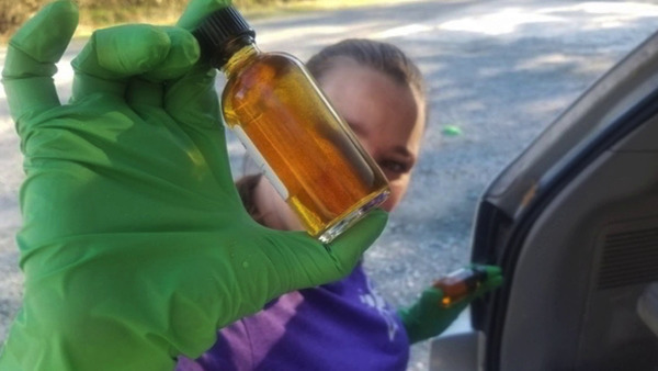 Sara Jay with a bottle