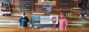 [Georgia Beer Company sponsor banner Suwannee Riverkeeper Songwriting Contest]