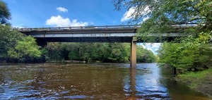 [Wide upstream, bridge, rapids]