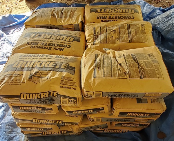 [Thirty 80-pound bags of QuiKrete]