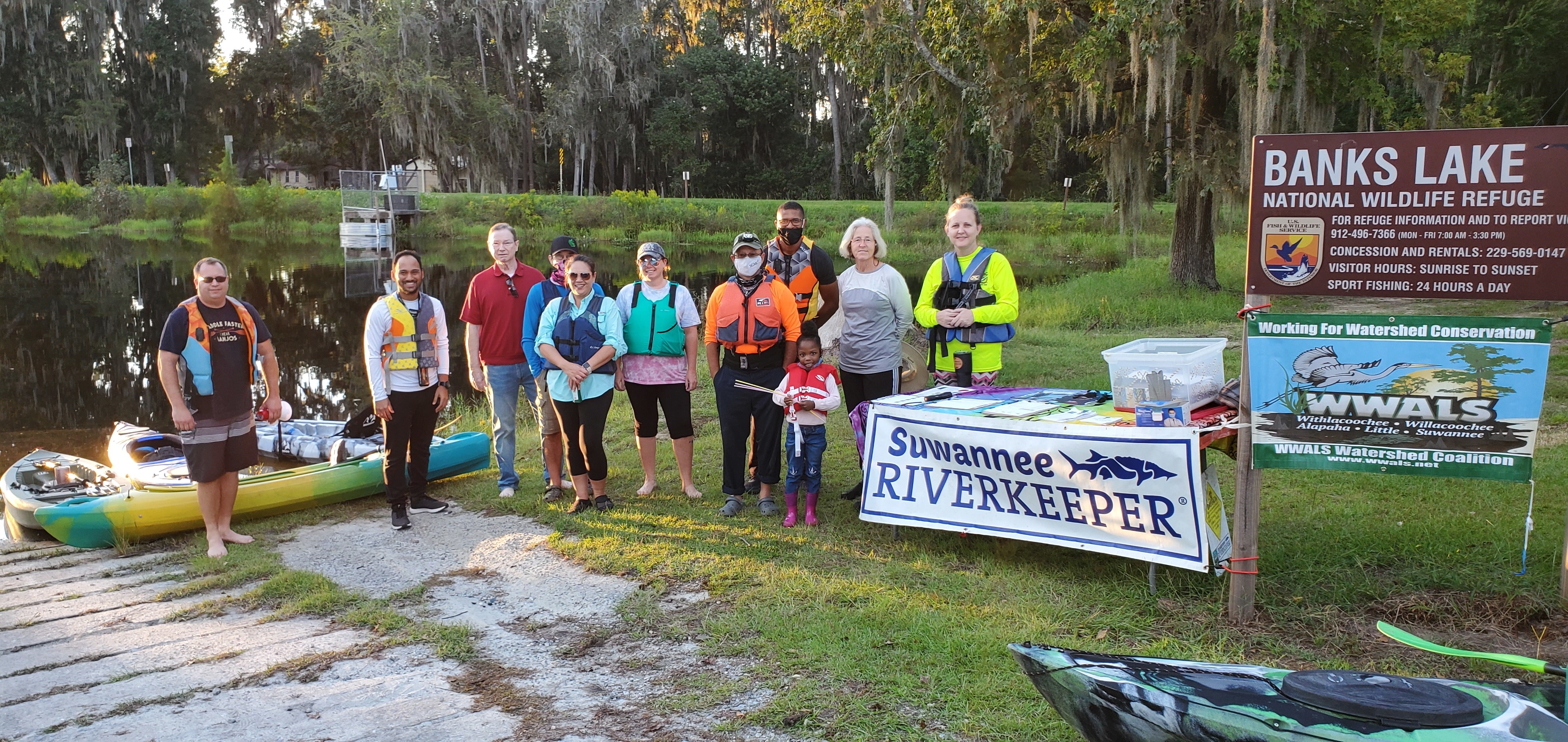 Banners with 9 of the 12 paddlers