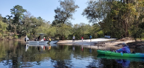 [Sheriff, Suwannee Riverkeeper banner, Gretchen]