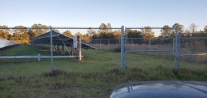 [Gate in chainlink fence]