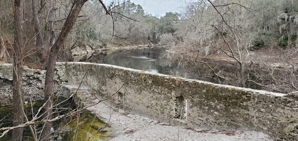 [Over the river wall]