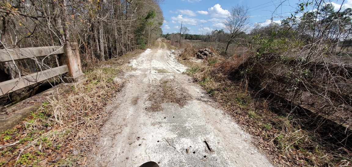 Inland bridge with sand on mud, 13:03:01, 30.7900872, -83.4487483