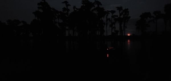 Boat light, moonrise