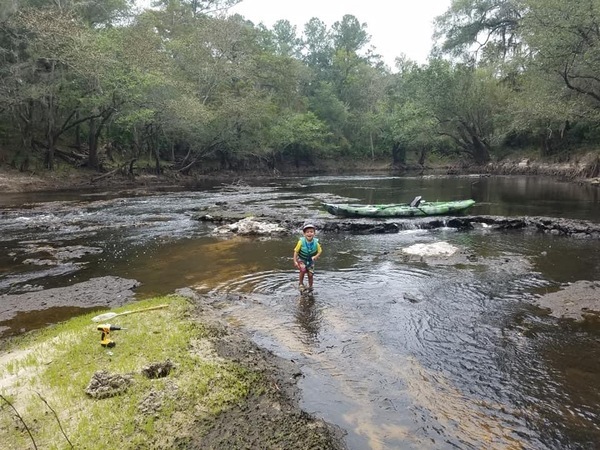 [Child, shoals below Little River Confluence, Withlacoochee River, Bobby-Mckenzie, 30.8466, -83.3483]