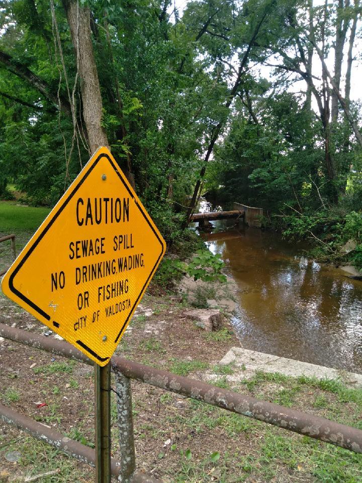 Caution sign, Wainwright Drive, Onemile Branch, sewer pipe