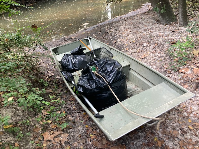 Bags of trash in boat