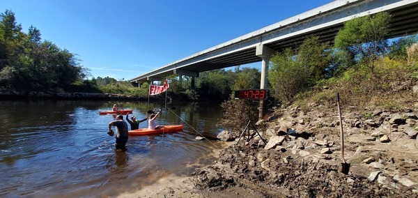 0:47:23 Bird Chamberlain crosses Finish before paddling