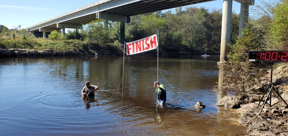 1:00:20 Bobby and Scotti still fixing the Finish banner