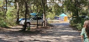 [Suwannee Riverkeeper banner on WWALS tent]