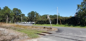 [RR crossing to parked trucks, 14:00:03, 31.0657880, -83.1968710]