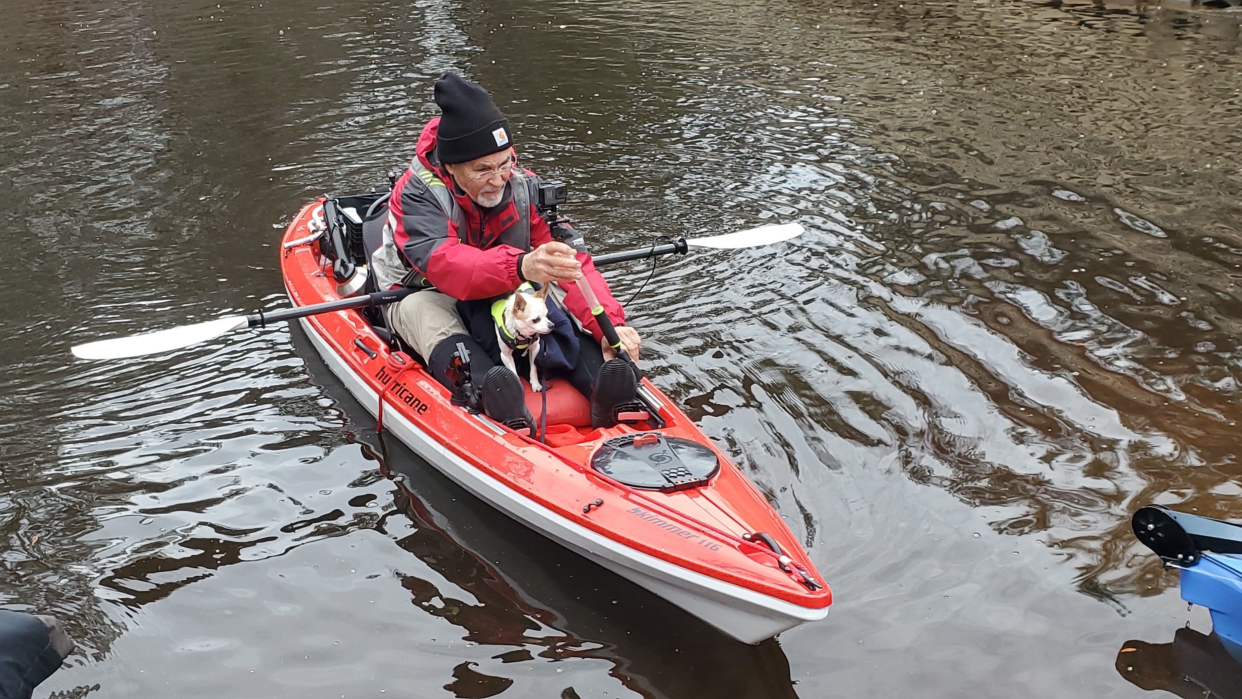 Ray Figueroa and Taco the dog at Gibson Park Boat Ramp, 14:32:54, 30.4376470, -83.0935130