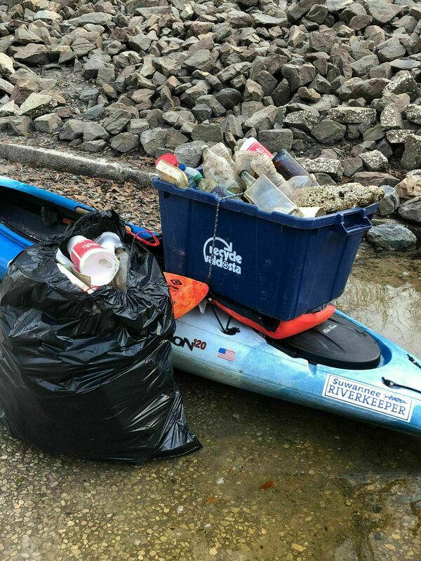 [Suwannee Riverkeeper sticker, Withlacoochee River trash in kayak 2022-02-22 Photo: Russell McBride]