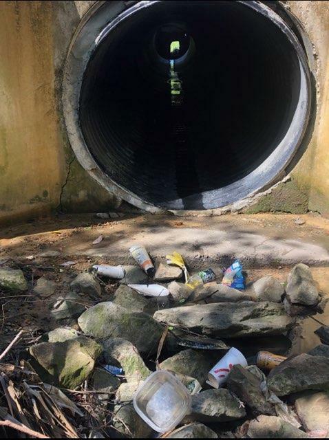 [Open drain and trash]