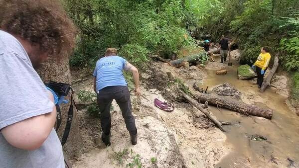 [Movie: Will videos Emily digging the small tire, 30.8622800, -83.2980380]