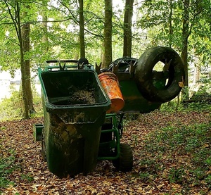 [The trash bin, tires, bucket, trash bags; Photo: Tom Potter, 10:26:09]