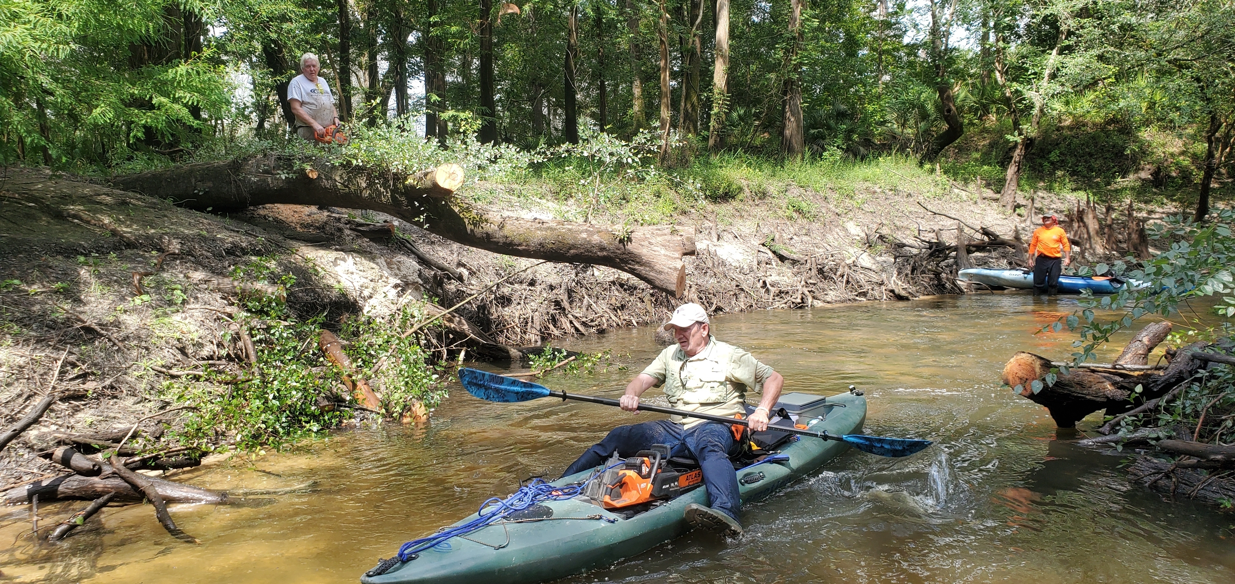 Phil Hubbard with saw, Phil Royce paddling, Russell Allen McBride, 11:17:06, 30.8458080, -83.3474060