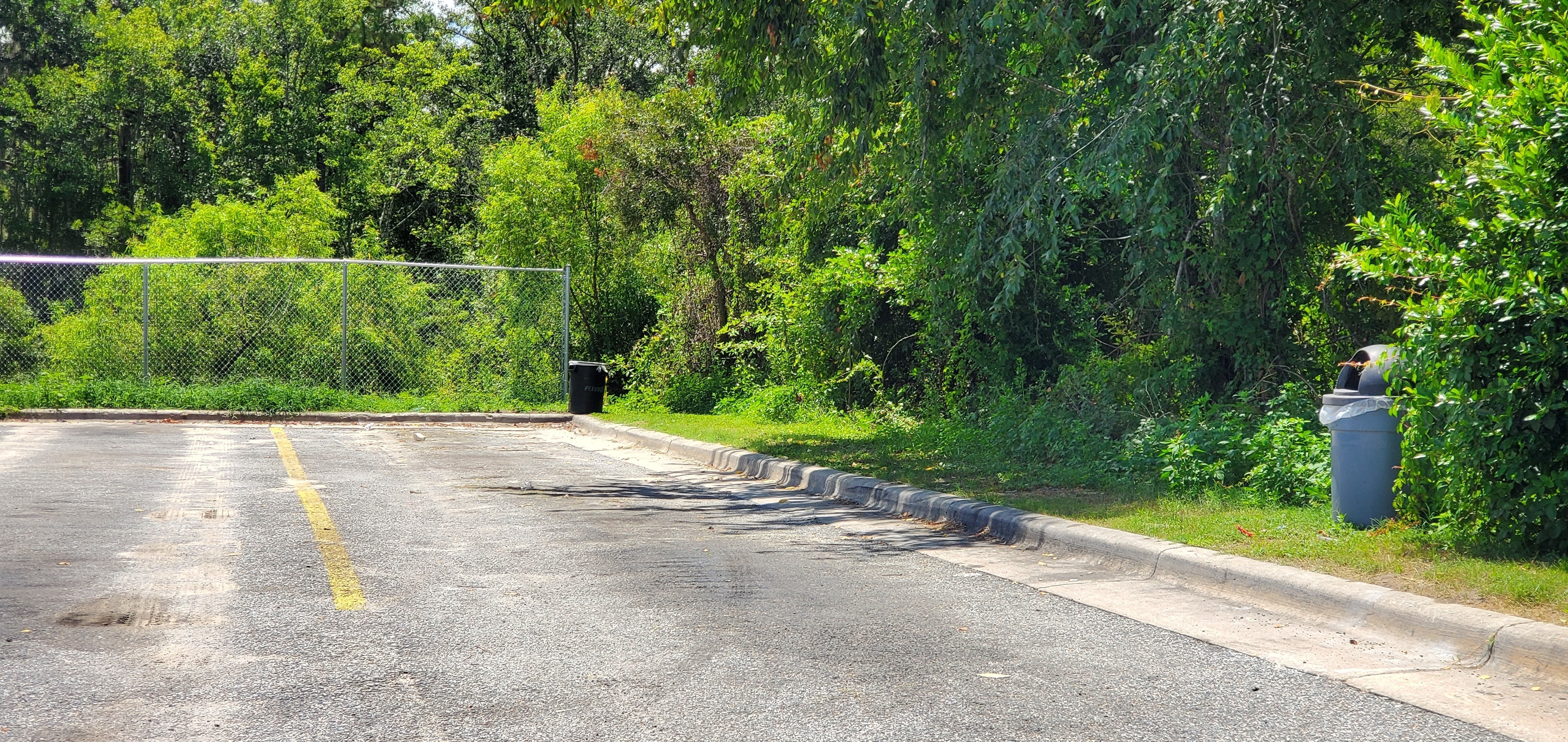 Southwest corner with trash cans, 12:36:33, 30.6400729, -83.1896884