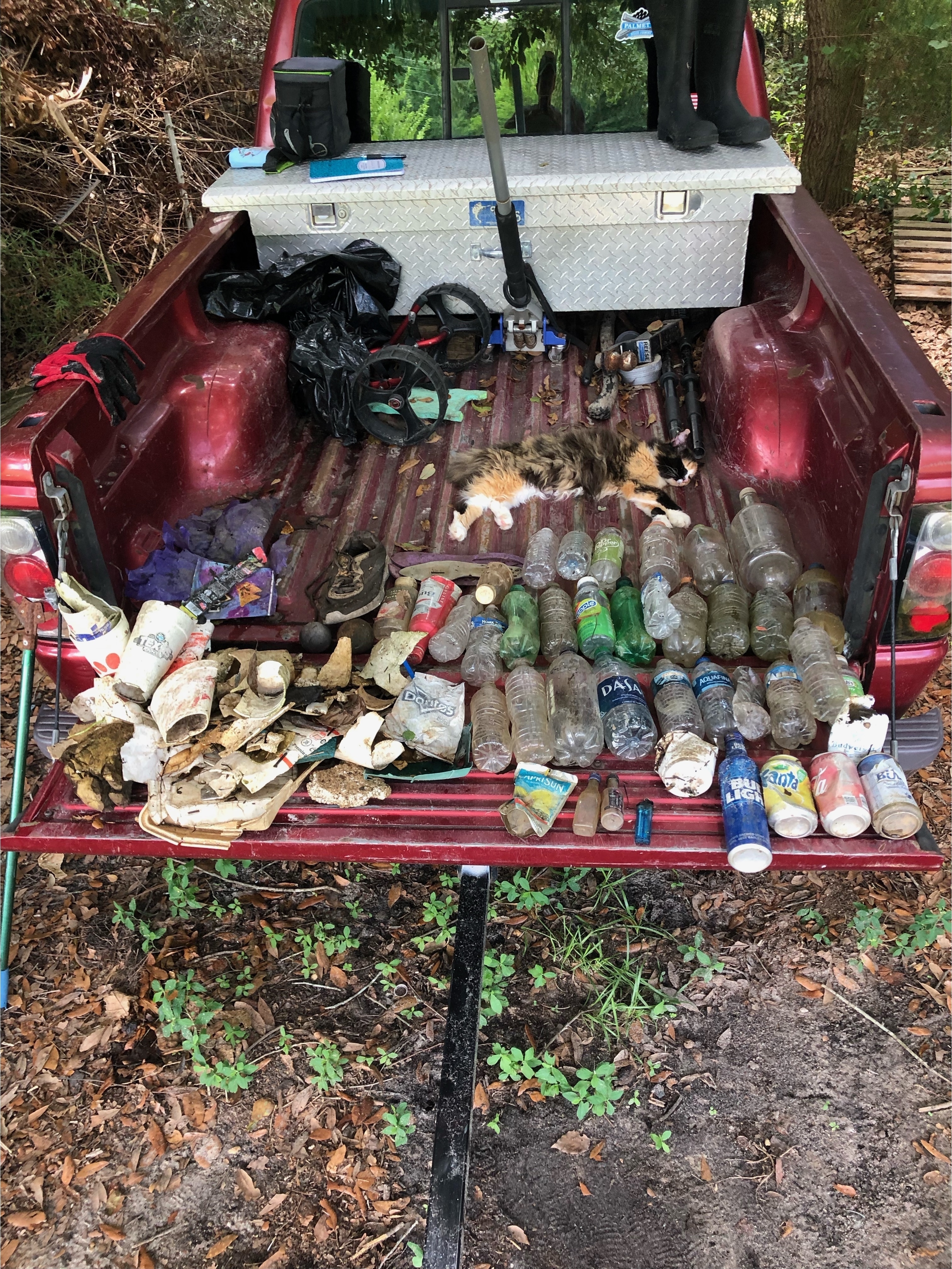 Trash on tailgate. Looks like we got rain after that.