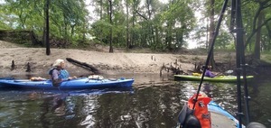 [Two paddlers with field behind, 10:16:07, 30.6245033, -83.0896887]