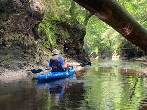 [Suwannee Riverkeeper under a deadfall --Shirley Kokidko]